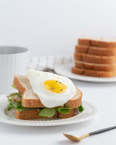 bread leaf vegetable with bread and egg breakfast