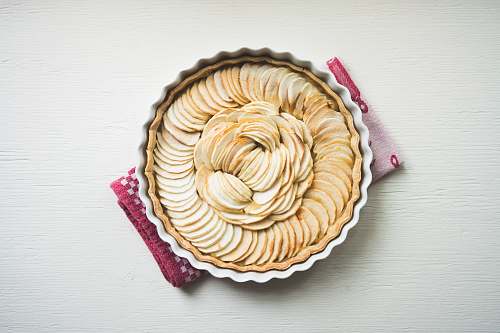 tart pastries on white ceramic bowl baking