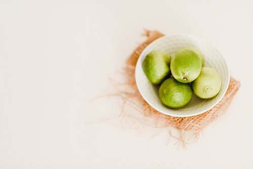 lime pile of lemon in bowl bowl