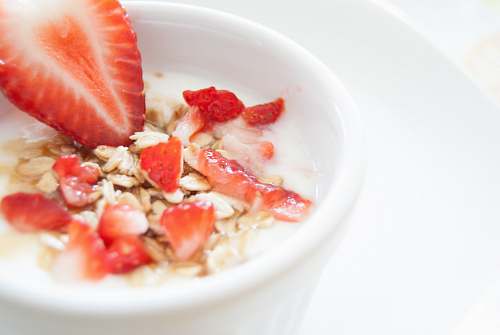 strawberries sliced strawberry in mug with flakes breakfast