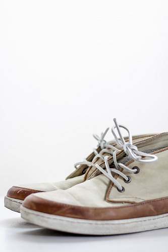 clothing pair of beige chukka boots shoe