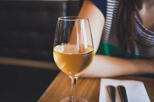 beverage clear wine glass on brown wooden table drink
