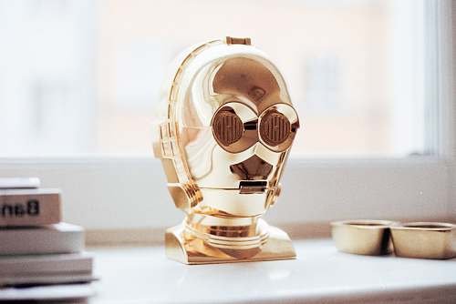 toy C-3PO decor on white surface c3po