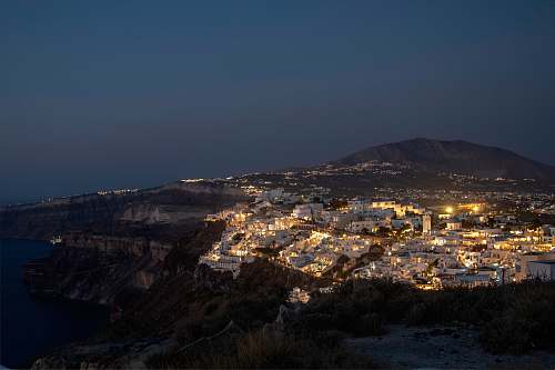 santorini aerial photography of city at nighttime unnamed road