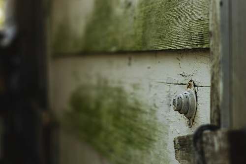 machine selective focus photo of white wooden top old