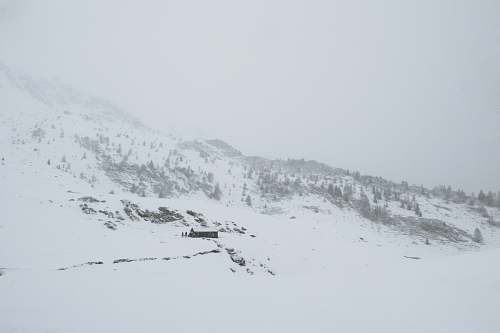 mountain black mountain covered by snow nature