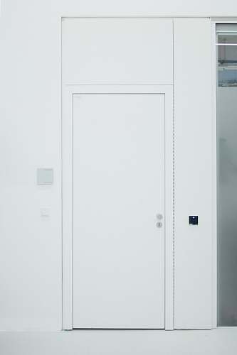 building closed white door door