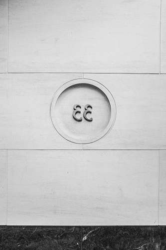 black-and-white gray steel 33 emblem on white surface new york