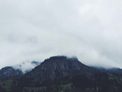 mountain photo of clouds covering mountain nature