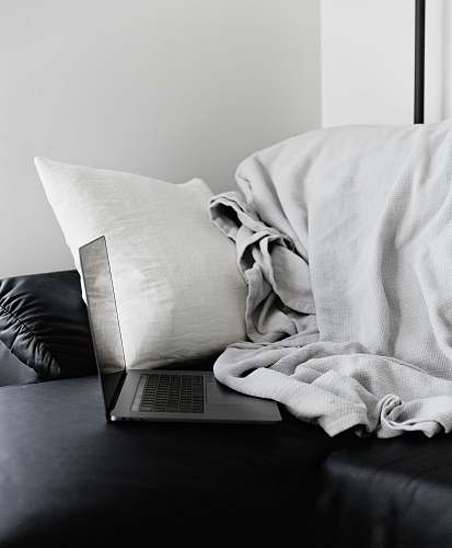 black-and-white silver MacBook home