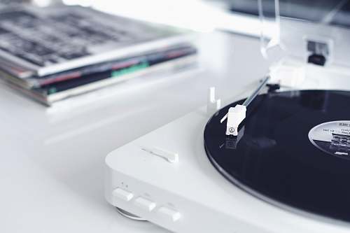 indoors white and black portable turntable electronics