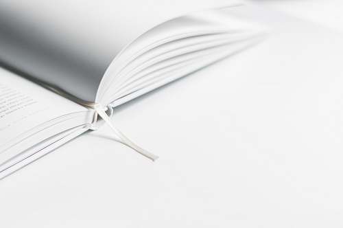 white white book marker on book page black-and-white