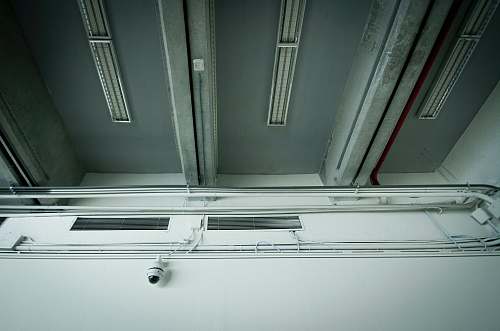 camera white CCTV camera on white wall security