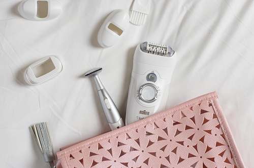 white white shaver on white textile pink