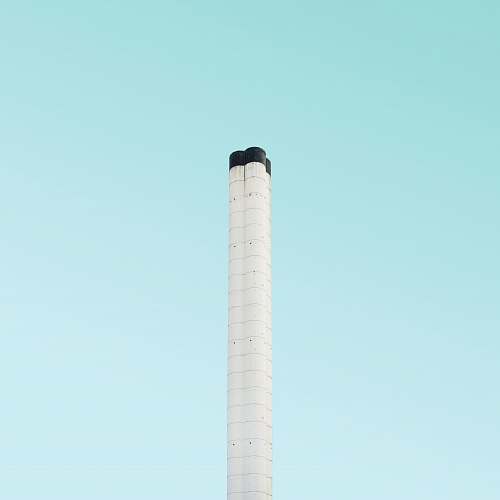 london white stick with teal background tower