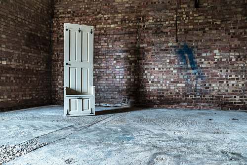 door white wooden 6-panel door in room wall