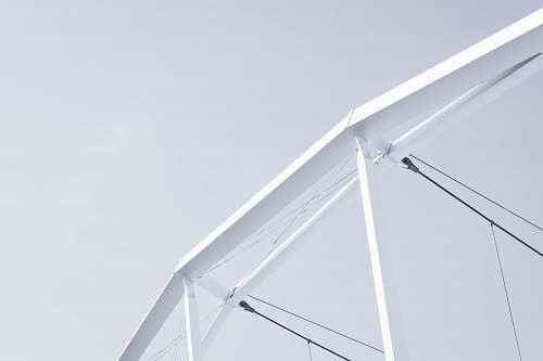 white white and black cable under white clouds at daytime banister