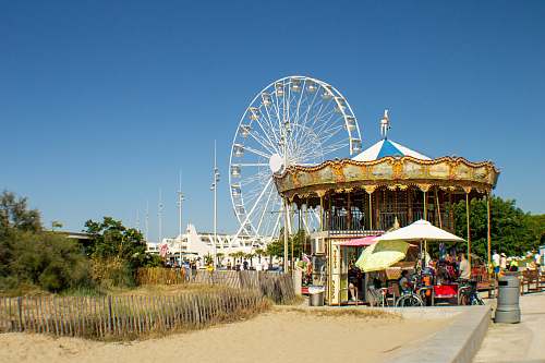 person brown carnival ride amusement park