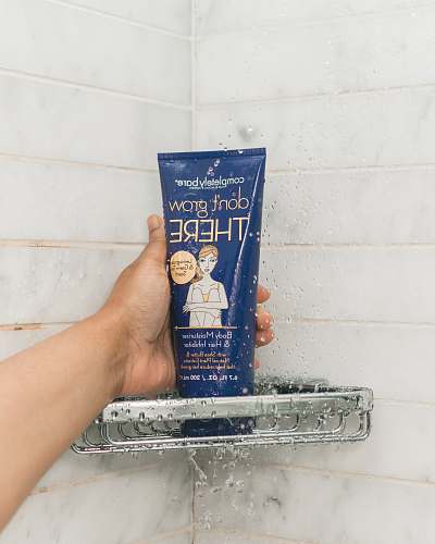 person Completely Bare Don't Grow Here soft tube bottle