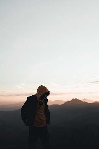 person man in hoodie outdoors