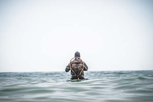 water man swimming in sea outdoors