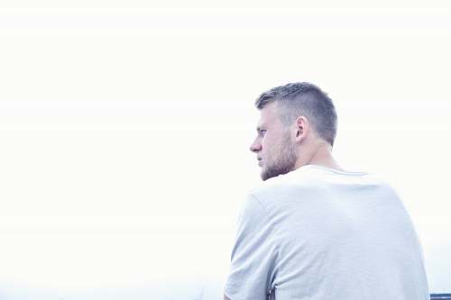person man wearing white crew-neck shirt face