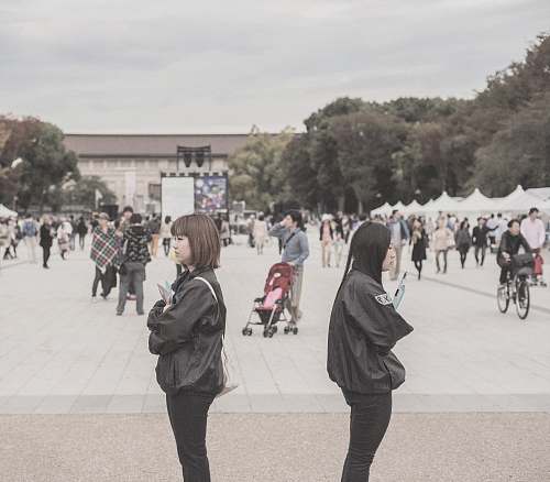 person people standing near building during daytime people