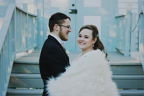 person wedding couple near stair during daytime photography people