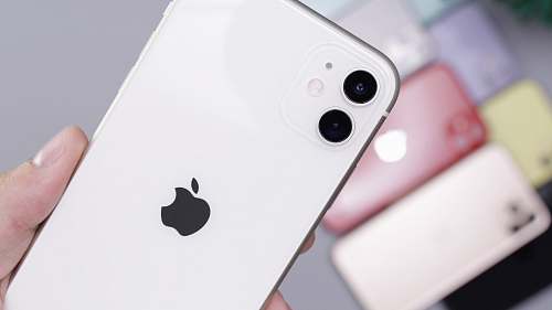 person white iPhone 11 Pro Max cell phone