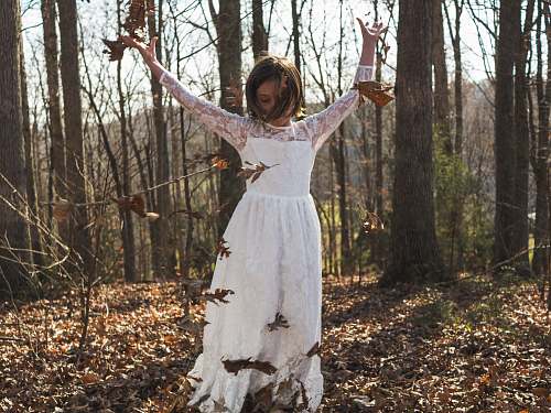 person woman raising her hands people