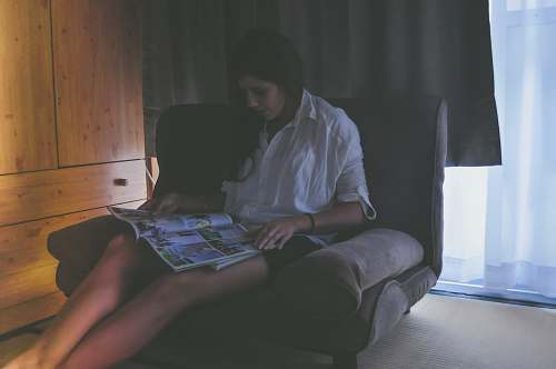 furniture woman siting while reading sitting