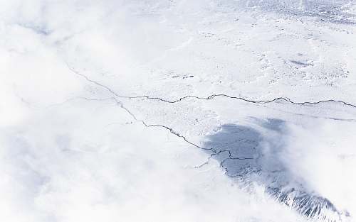 cloud aerial photography of snow field aerial