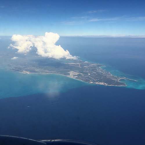 nature high angle photography of green island outdoors