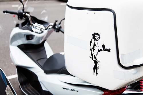 stencil white and black motor scooter with top box motor scooter
