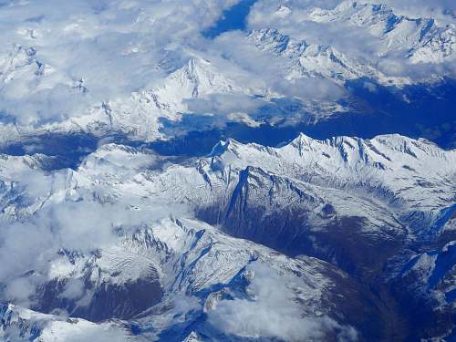 snow aerial photography of snow-coated mountains alps