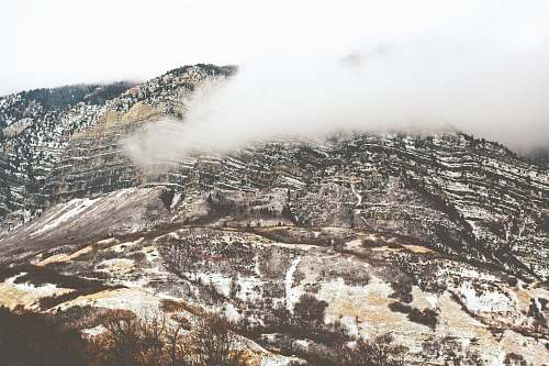 nature aerial view of snow field mountain mountain range