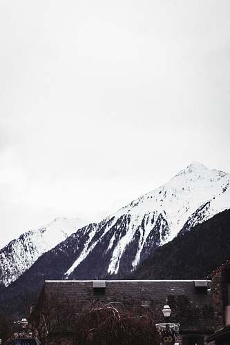 alps brown house near mountain ranges nature