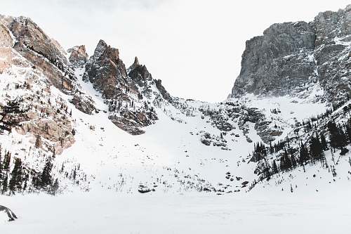 nature brown snow capped mountain outdoors