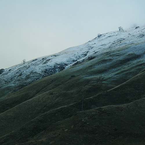 nature gray and white mountain with snow field snow
