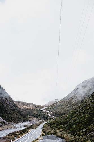 nature highway covered with fog outdoors