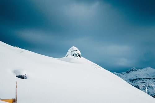 snow mountain covered by snow blue