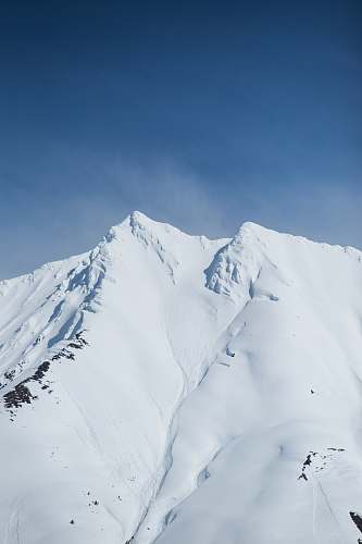 peak mountain covered with snow photo snow