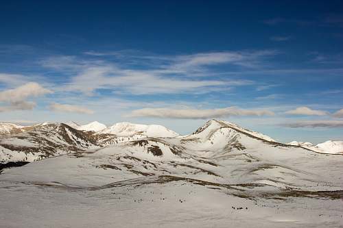 alps mountains covered with snows under white cloudy sky nature