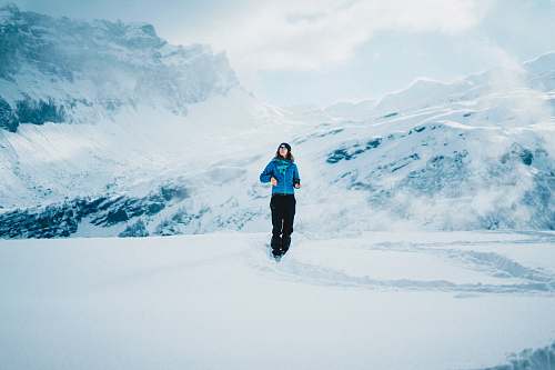 snow person standing on snow mountain refuge du grenairon le buet