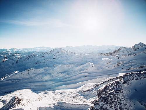 nature snow mountain under white sky snow