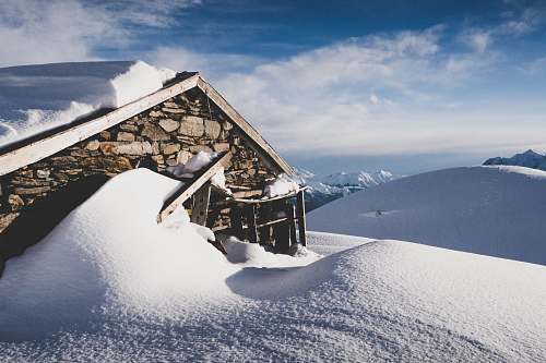 hill stone house in snowfield cliff