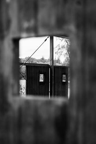 black-and-white black and white wooden panel outdoors
