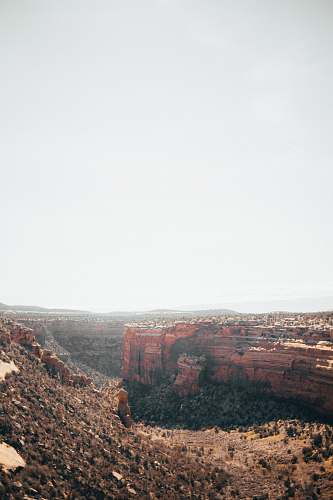 outdoors brown land formation under blue sky mountain