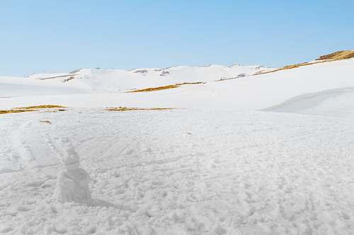outdoors field covered with snow during daytime grey