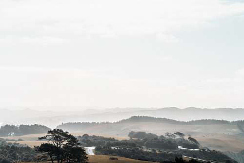 outdoors landscape photo of mountains during daytime weather